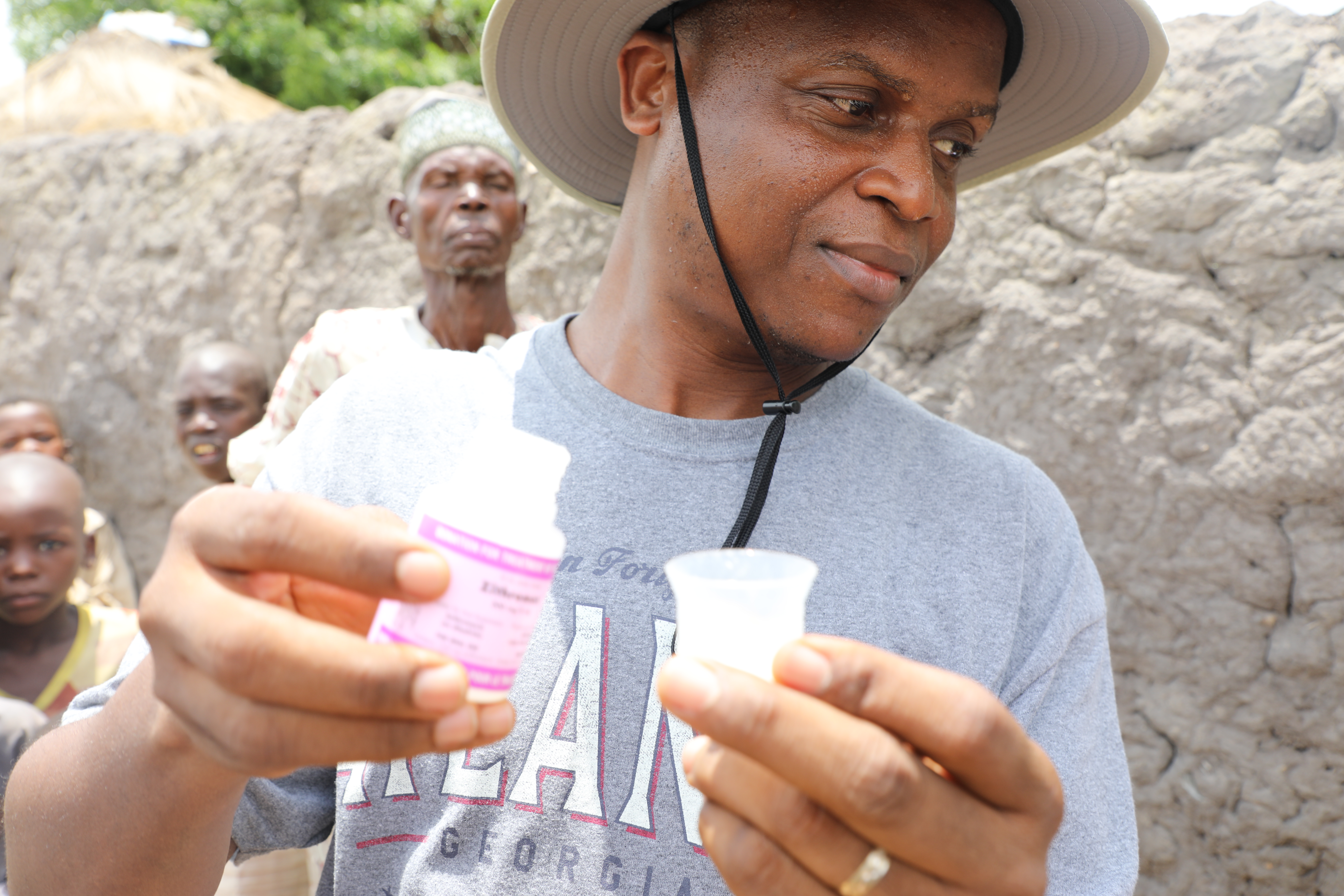 Dr. Nicholas Olobio at a mass drug administration in Sokoto, Nigeria in 2017